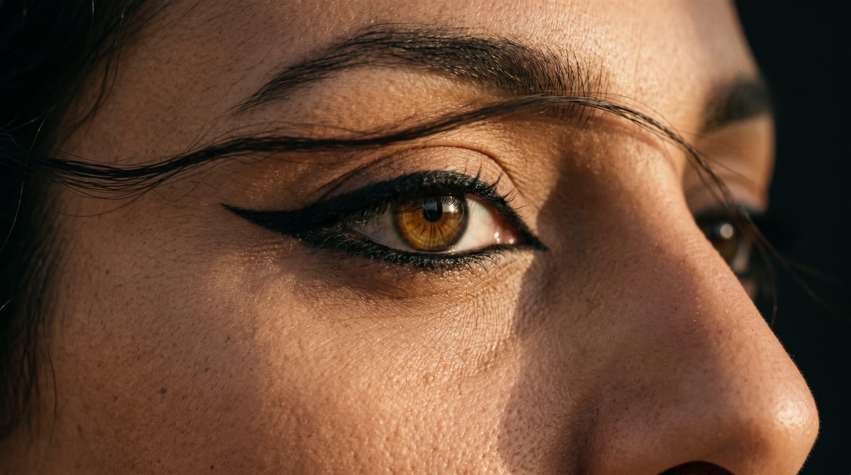 Close-up of an eye with dramatic kohl eyeliner